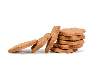 Star shaped baked chocolate gingerbread cookie isolated on white background