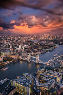 Elevated view of the London skyline: from the Tower Bridge to the financial district Canary Wharf just after sunset, United Kingdom