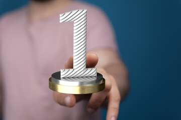 success gold winner first place in hand