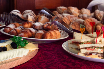Dishes on the table with a red tablecloth