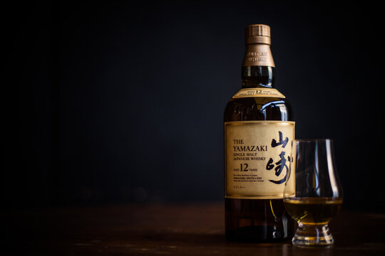 Yamazaki Single Malt Japanese Whisky Bottle And A Glencairn Whisky Glass