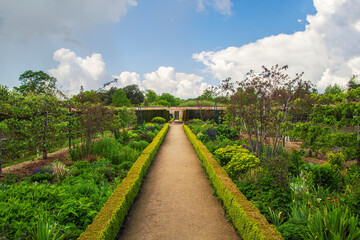Fototapeta na wymiar Central path through an english country garden.