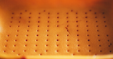 Orange texture in the holes in the tray
