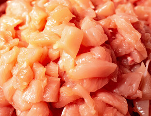 
Raw sliced ​​chicken pieces. To cook. Preparing for dinner. Cooking. A restaurant. Cafe. Workflow of cooking food