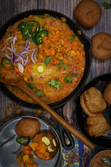 Indian pav bhaji- mixed spicy vegetables served with wholewheat bun