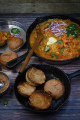 Indian pav bhaji- mixed spicy vegetables served with wholewheat bun