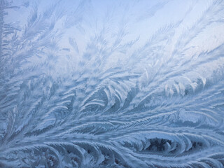 Beautiful frosty patterns on the window. Natural textures.