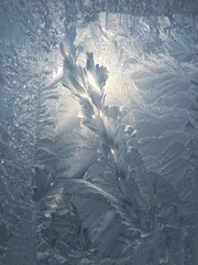 Beautiful frosty patterns on the window. Natural textures.