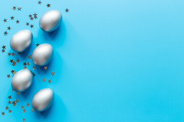 Silver Easter eggs. Easter decoration, top view