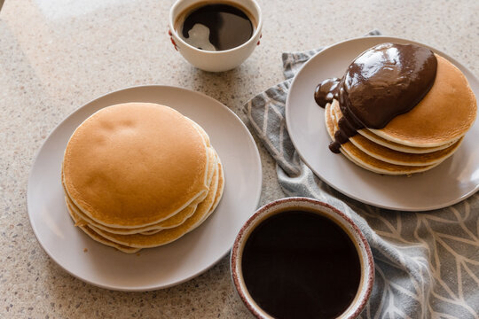 stacks of pancakes with chocolate