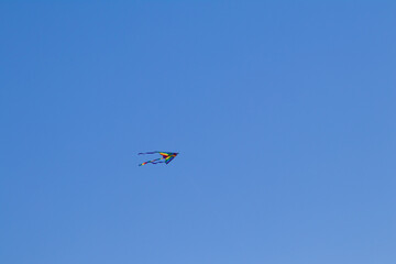 kite flying in the blue sky