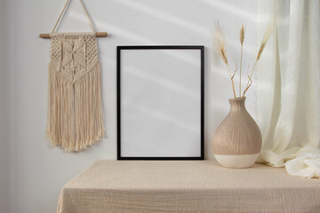 Black frame mockup with vase