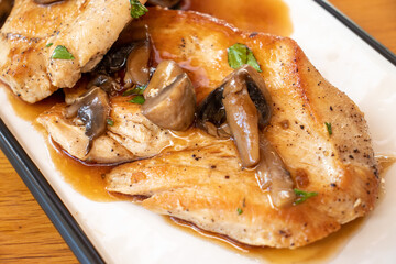 Pork chop with mushrooms and sauce