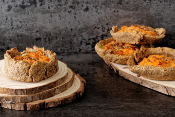 Pie with carrot and potato filling with caraway seeds. Rye flour homemade pastry.