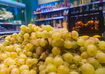 white grapes close-up on sale in a grocery supermarket
