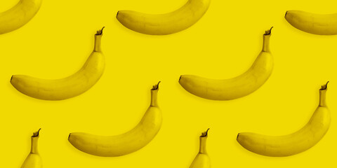 Yellow banana background pattern. Seamless pattern texture of many same fruits.