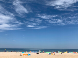 Fototapeta na wymiar Sandy beach and blue sky 