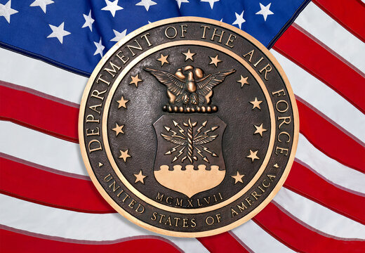 Los Angeles, California  USA - March 12 2019: U.S. Air Force logo or emblem on American flag background
