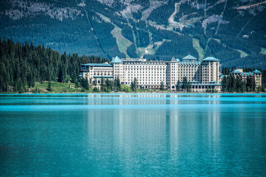 fairmont chateau and a canoe at lake louise in banff national park