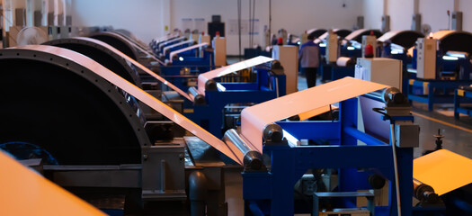 Manufacturing circuit board copper foil modern manufacturing assembly line. Digital industrial...