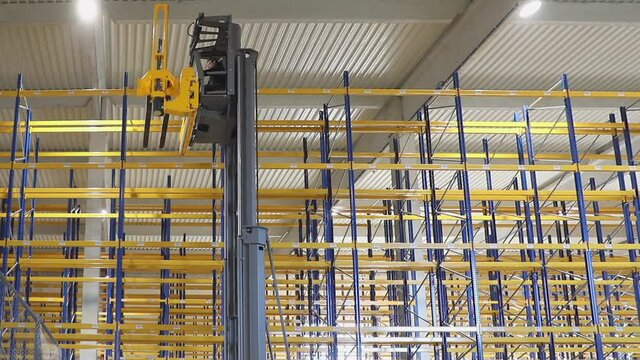 High Rack Stacker Forklift in New Distribution Warehouse