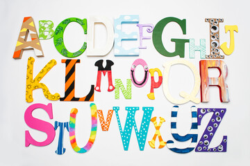 Alphabet in bright colors on white background