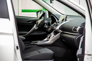 empty interior of modern premium car. black interior, driver's seat