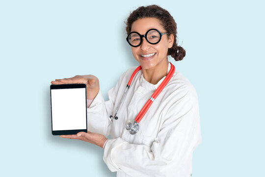 Studio portrait of black woman doctor holding digital tablet