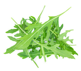 Rucola leaves isolated on white background. Rocket salad or arugula heap, top view.