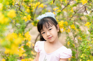 little girl with flowers