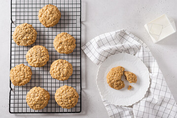 Vegan oatmeal cookies with raisin and nuts. Healthy vegan detox dessert on a light background. Top view. Product place.