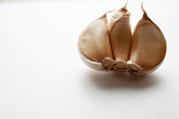 Isolated garlic. Raw garlic with segments isolated on white background, with clipping path