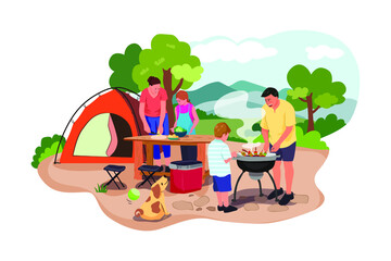 Fototapeta premium Happy family at a picnic is preparing a barbecue grill outdoors