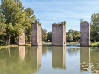 remains of the old bridge at Lussac Les Chateaux France