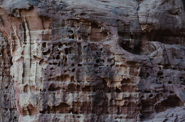 surface structure of brown shades of natural stone outdoors in nature