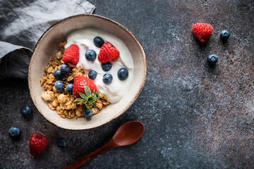 Healthy breakfast, cereal with berries and yogurt
