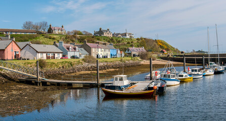Fototapeta na wymiar boats in a scottish harbour at Helmsdale, Sutherland