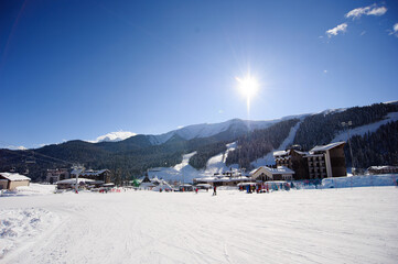 Ski area covered with fresh snow in winter