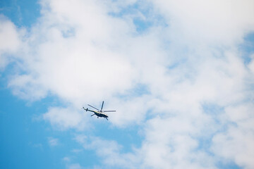 View of a helicopter in the sky. Helicopter ground view.