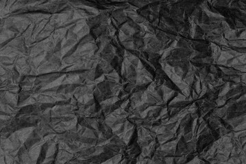 Crumpled black paper for background image