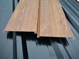 How to install artificial wood wall panels.