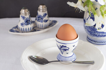 Boiled egg on white and blue Delft porcelain 