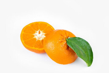 Ripe fresh juicy tangerines with leaves on white background