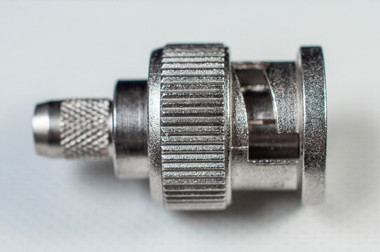 bnc connector for transmitting video and audio signal in filmmaking close-up on a white background, macro photography