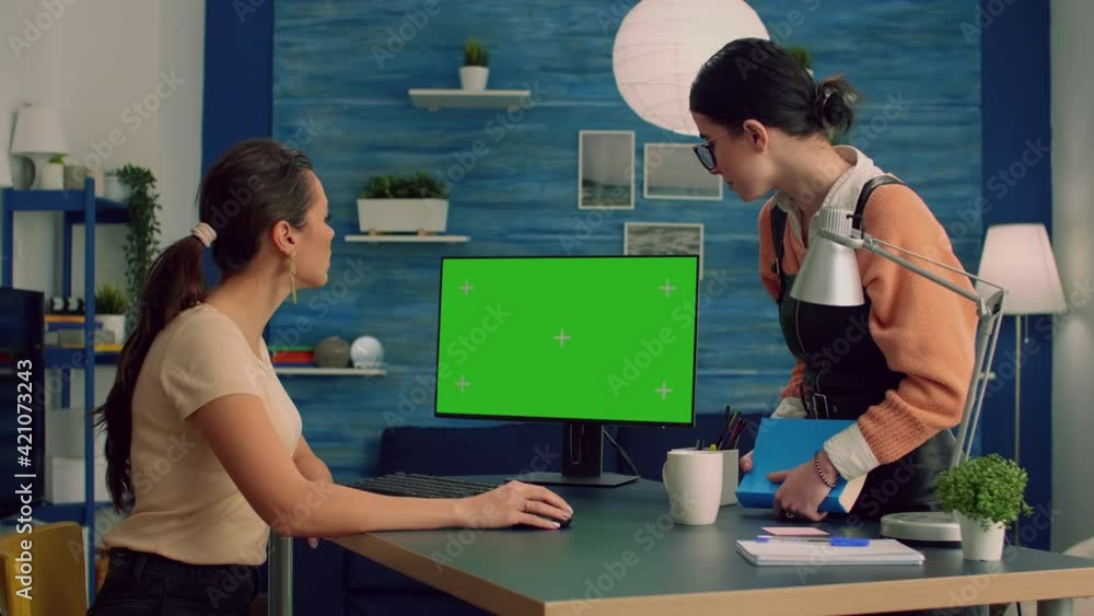 Poster teammates talking about business communication working on computer with mock up green screen chroma 