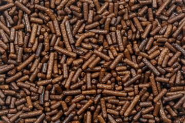 Chocolate Vermicelli Background (Chocolate Sprinkles),Chocolate,Sugar Sprinkles,Full Frame,Textured,No People,Backgrounds,Candy,Vermicelli,Brown,Close-up,Dark,