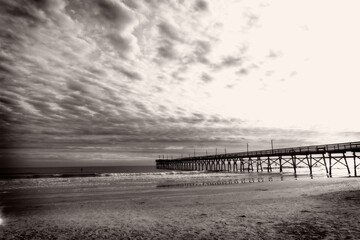 Lone Fisherman by the Pier