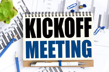 Kick-off meeting . Concept Image. Text on white notepad paper on light background. Business and financial conzept - obrazy, fototapety, plakaty