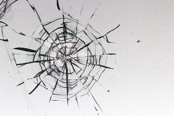 Cracks on the glass on a white background.