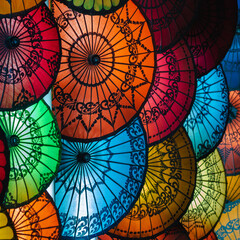 Colourful sun umbrellas at traditional street market in Bagan, Mandalay Region, Myanmar (Burma). 